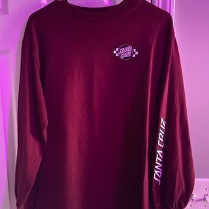 A long sleeve burgundy Santa cruz tee